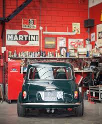 Live this picture from @silodrome. The car and garage are just perfect - Dm  and share your story... | Mini cooper, Mini cooper classic, Classic mini